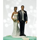 La figurine de mariage pinc&eacute;e d'amour